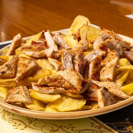 - Restaurante Asador Tio Manolo Hotel 2*