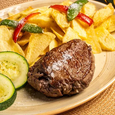 - Restaurante Asador Tio Manolo 2*